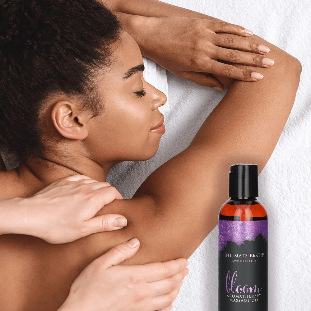 Intimate Earth Massage Oil in Fresh Cut Grass Scent