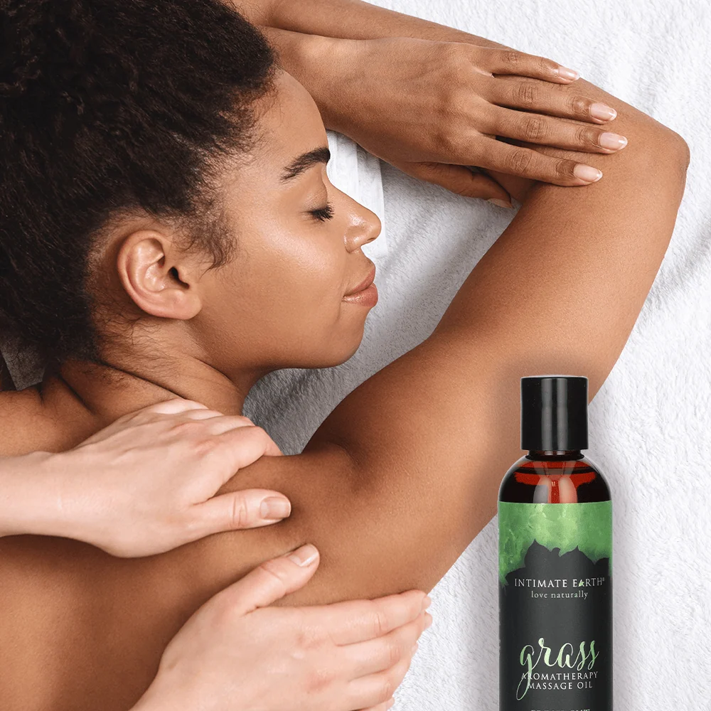 Intimate Earth Massage Oil in Fresh Cut Grass Scent