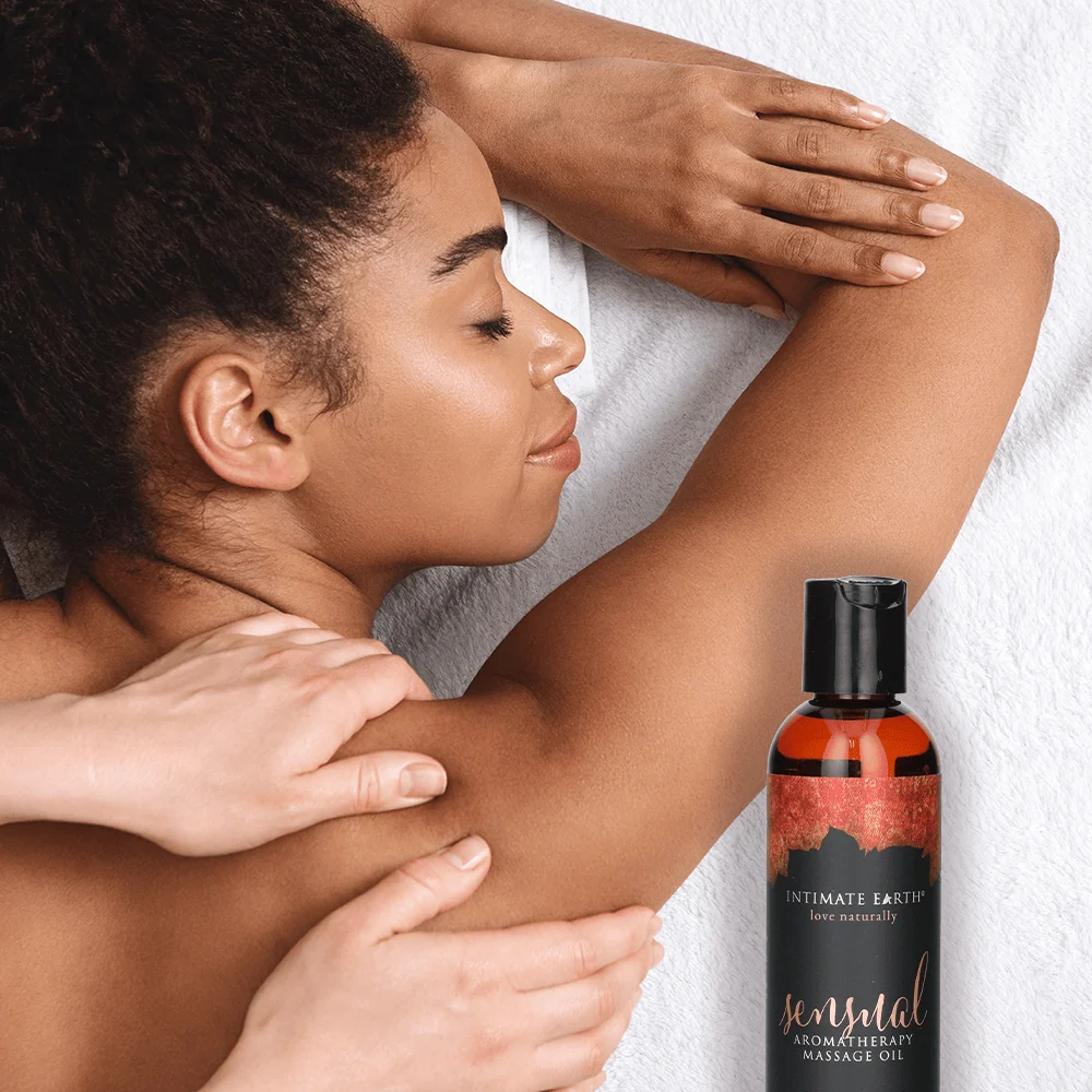 Intimate Earth Massage Oil in Fresh Cut Grass Scent