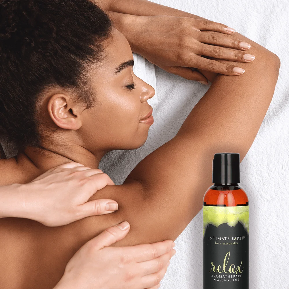 Intimate Earth Massage Oil in Fresh Cut Grass Scent
