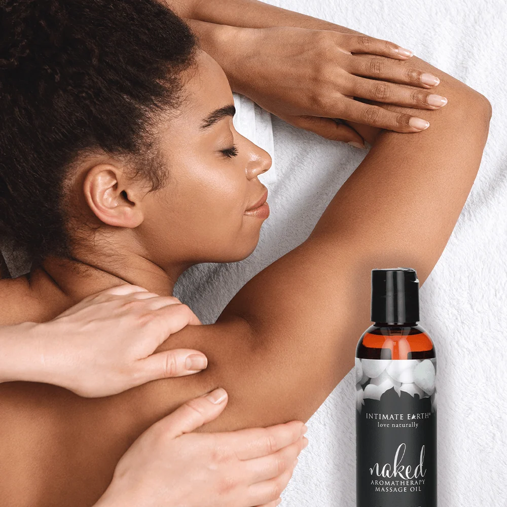 Intimate Earth Massage Oil in Fresh Cut Grass Scent