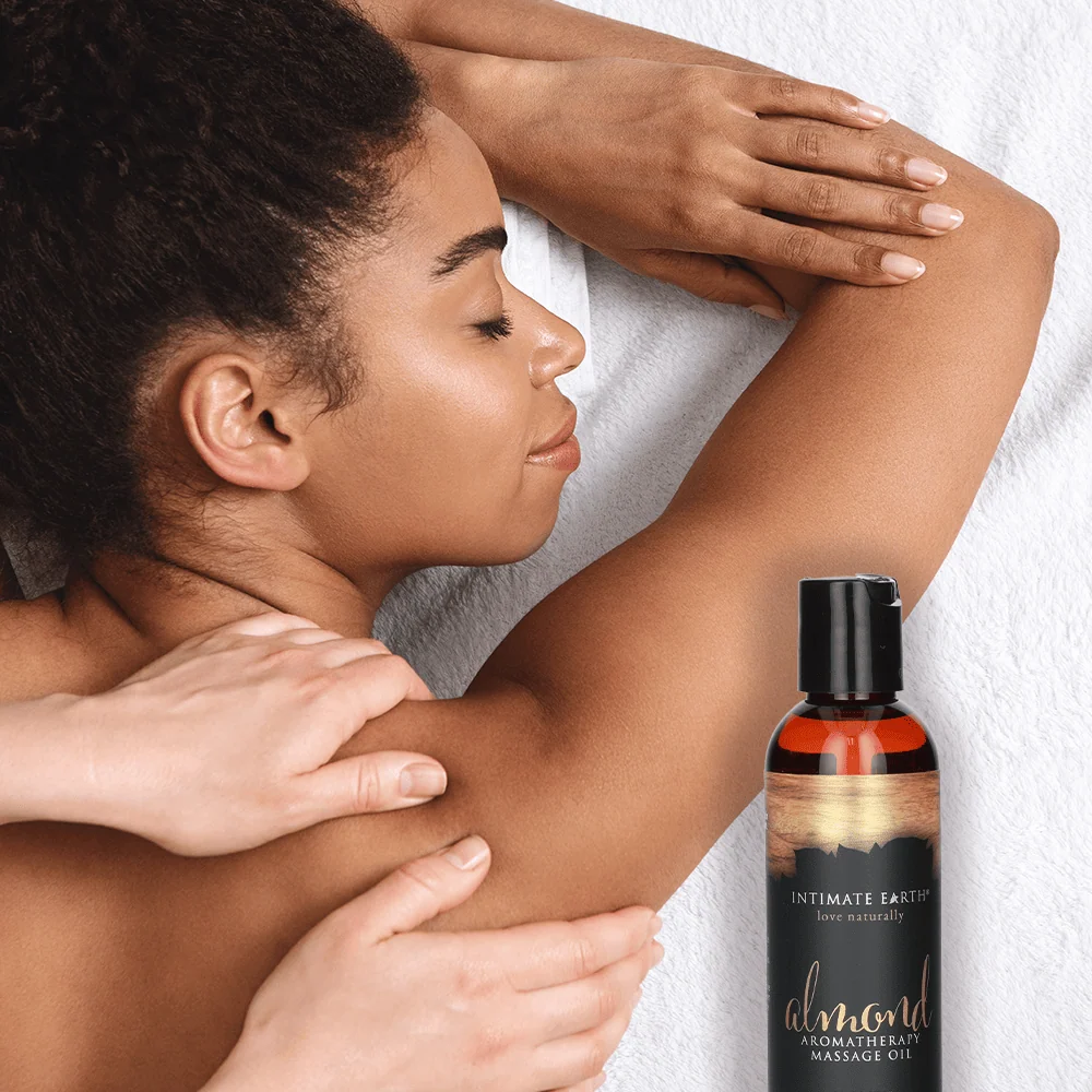 Intimate Earth Massage Oil in Fresh Cut Grass Scent